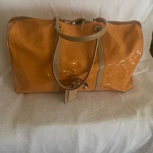 ARCADIA
Italy Bag -Orange/Tan Patent Leather Duffle